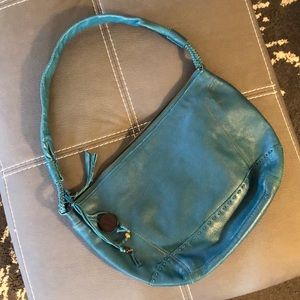 The Sak turquoise purse